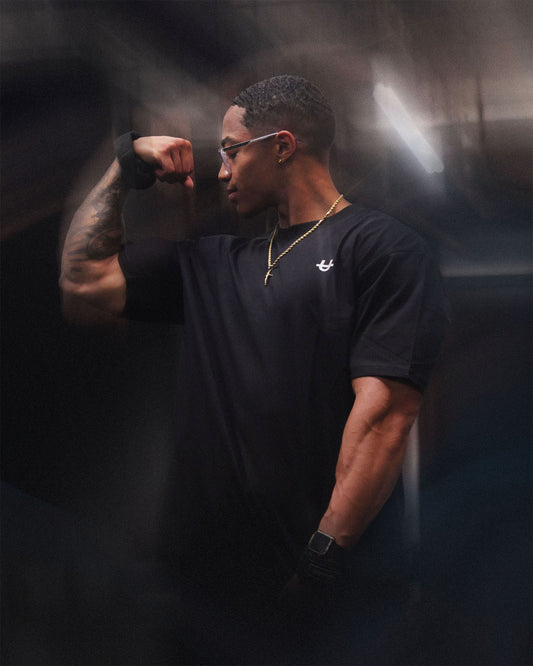 man flexing biceps