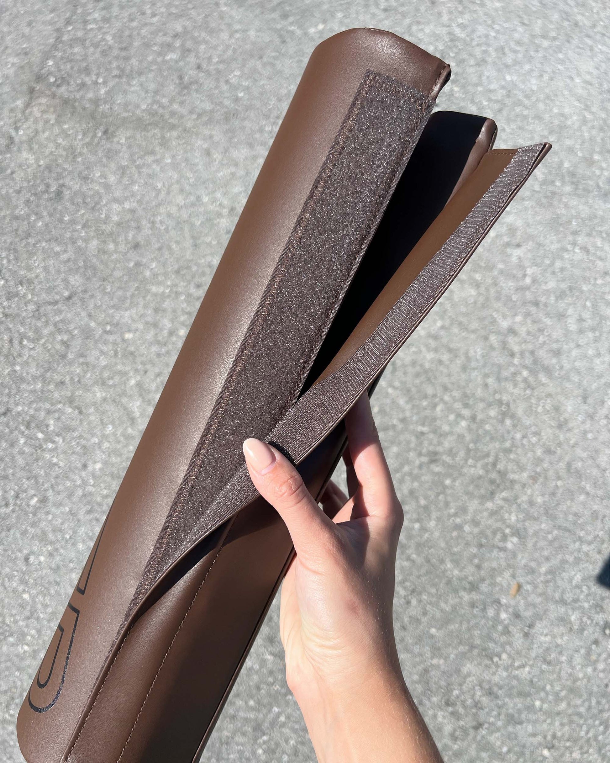 close-up of umber uppper barbell pad showing velcro closure