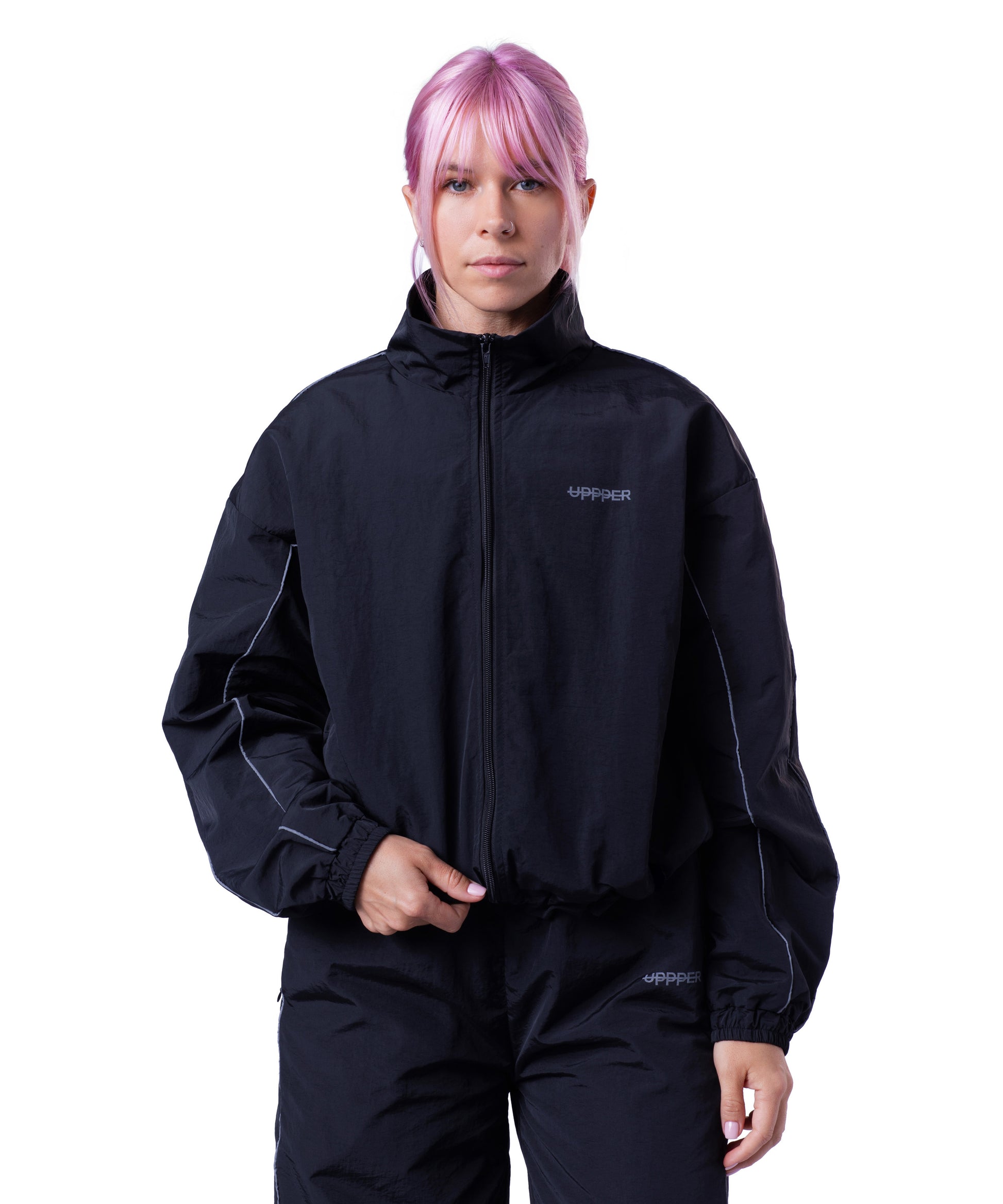 front of black uppper track jacket with reflective stripe detail on white background