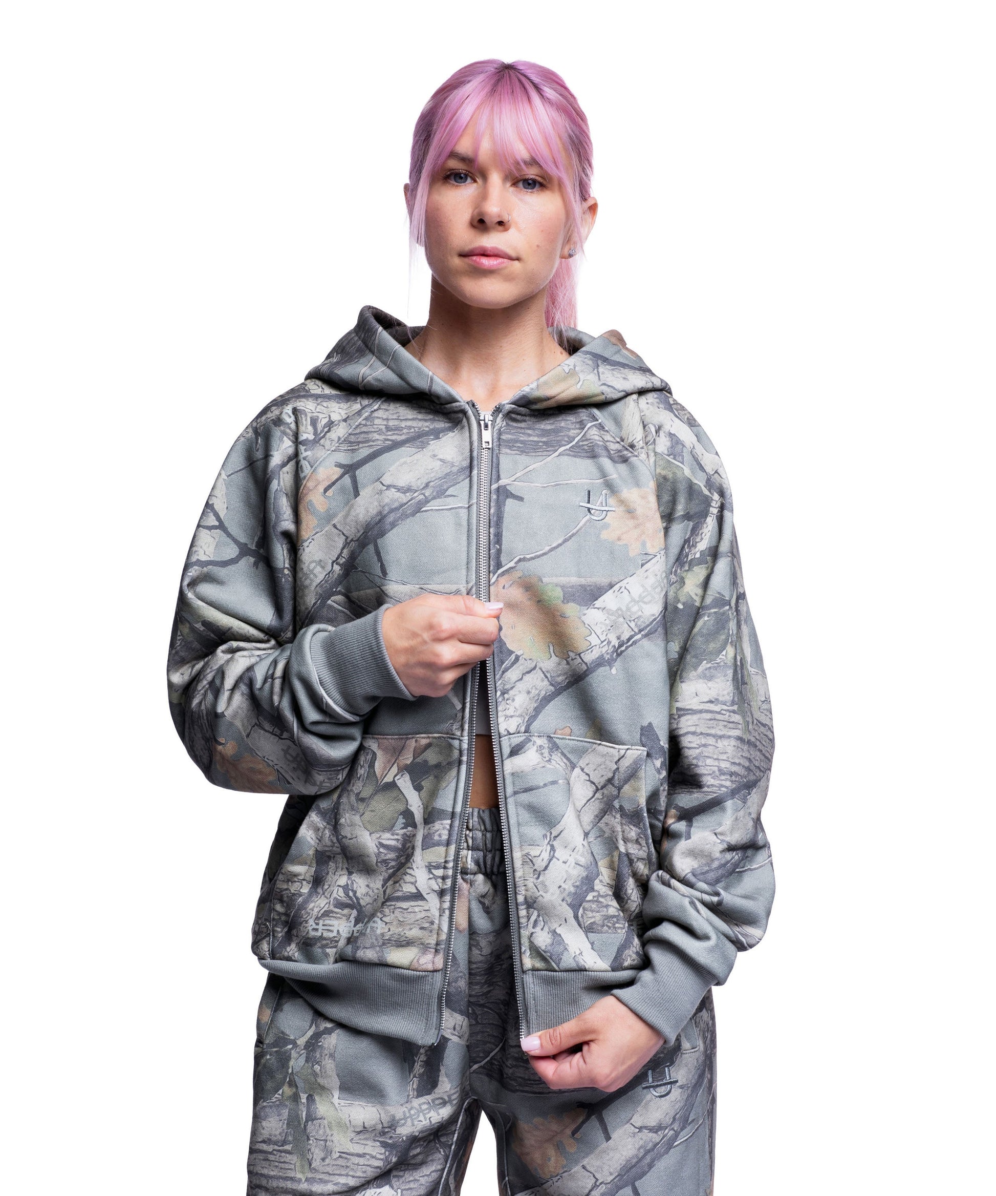 model wearing camo uppper double zip hoodie womens