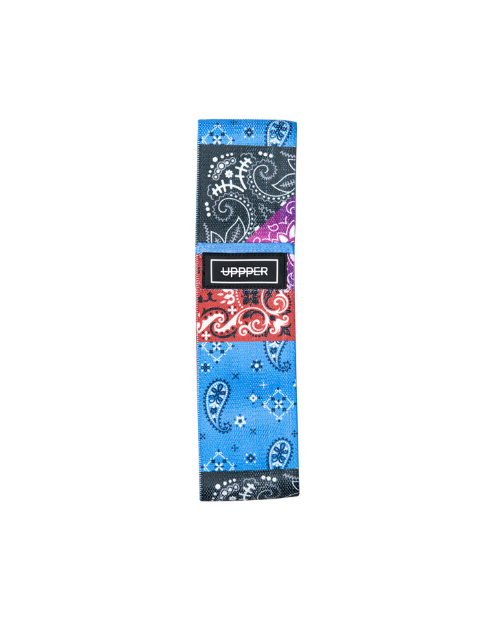 uppper fabric hip resistance band with bandana print laid flat on white background