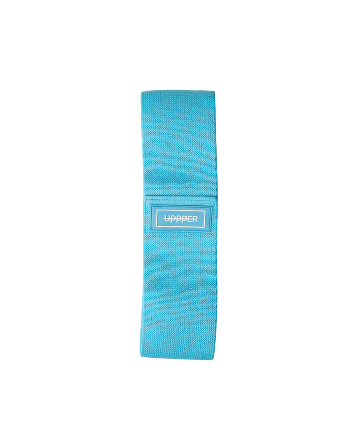 blue uppper fabric hip resistance band laid flat on white background