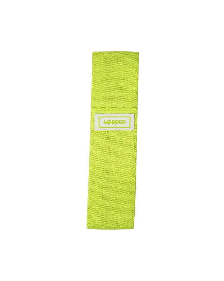 neon green uppper fabric hip resistance band laid flat with uppper label on white background