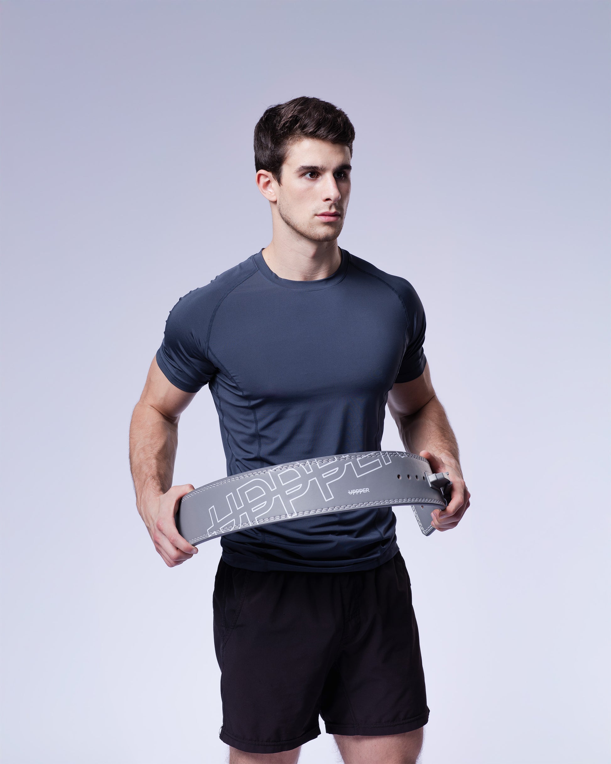 athlete showing grey uppper lever belt