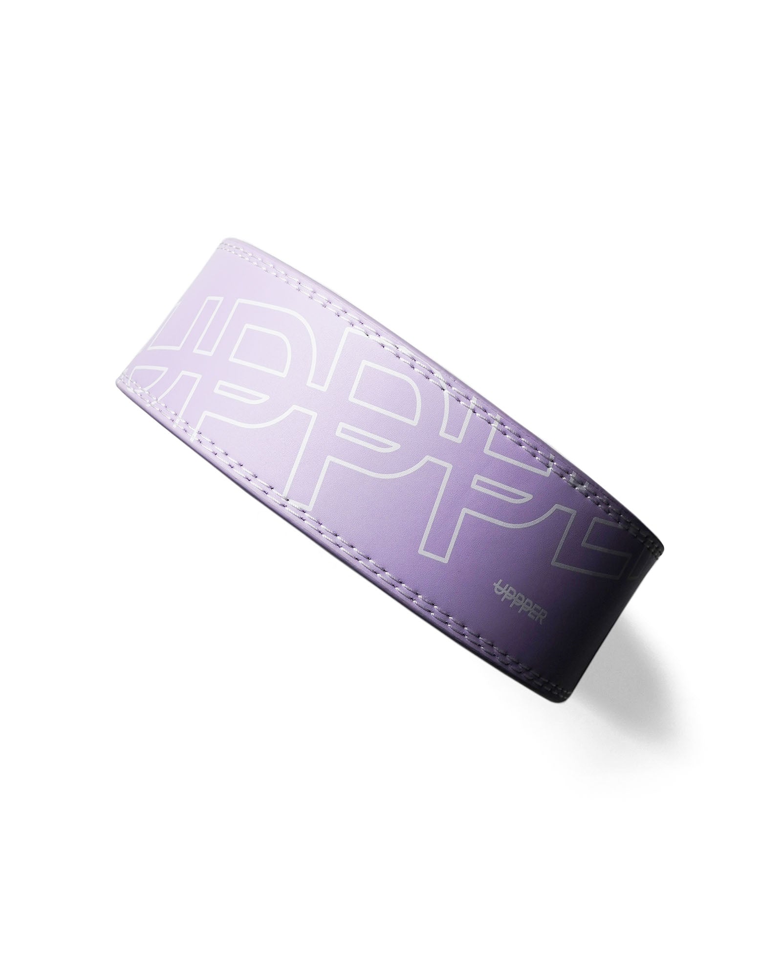 lavender uppper leather lever belt flat lay showing stitching detail and lever buckle