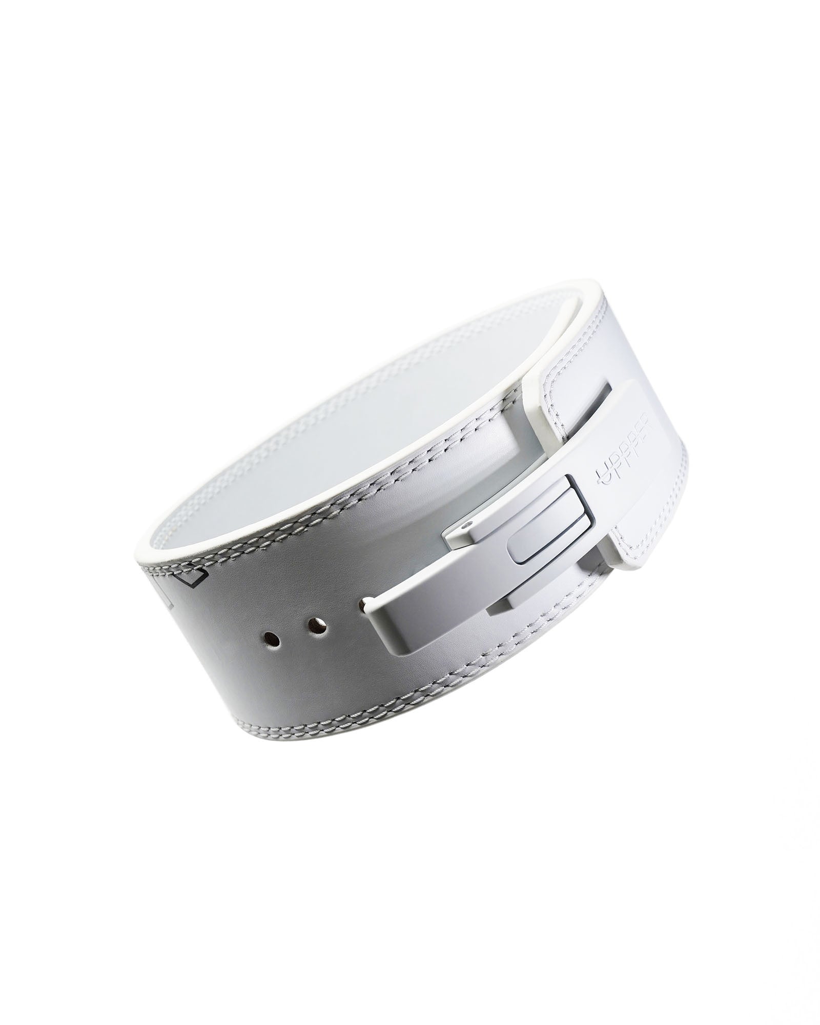 white uppper leather lever belt coiled showing lever buckle mechanism on white background