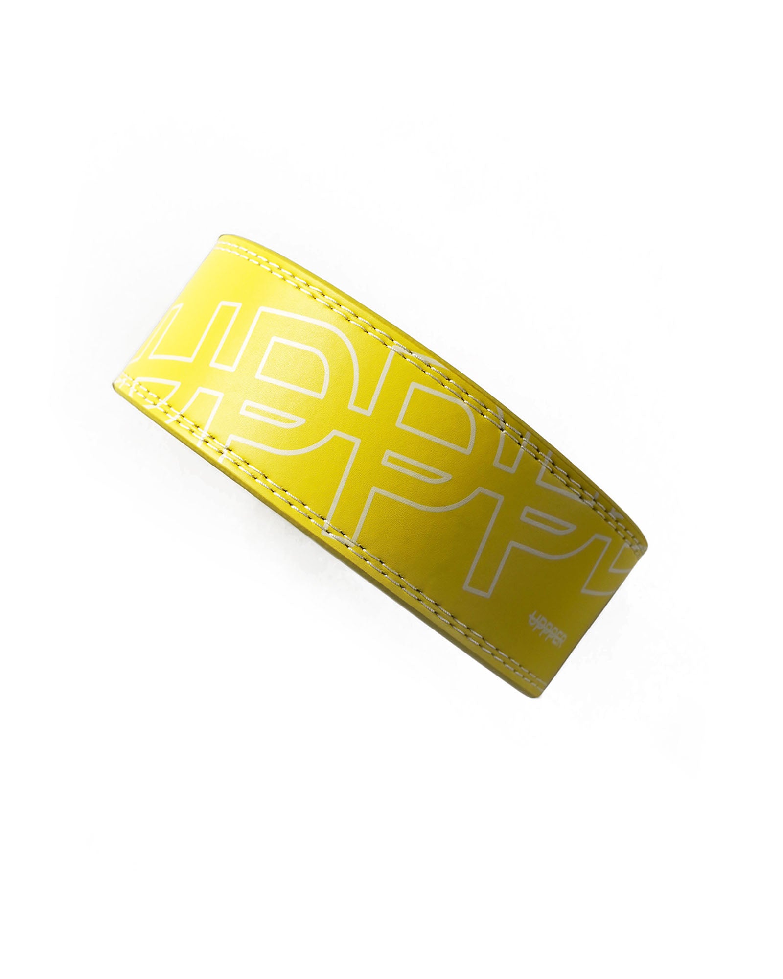 yellow uppper leather lever belt flat lay showing stitching detail and lever buckle