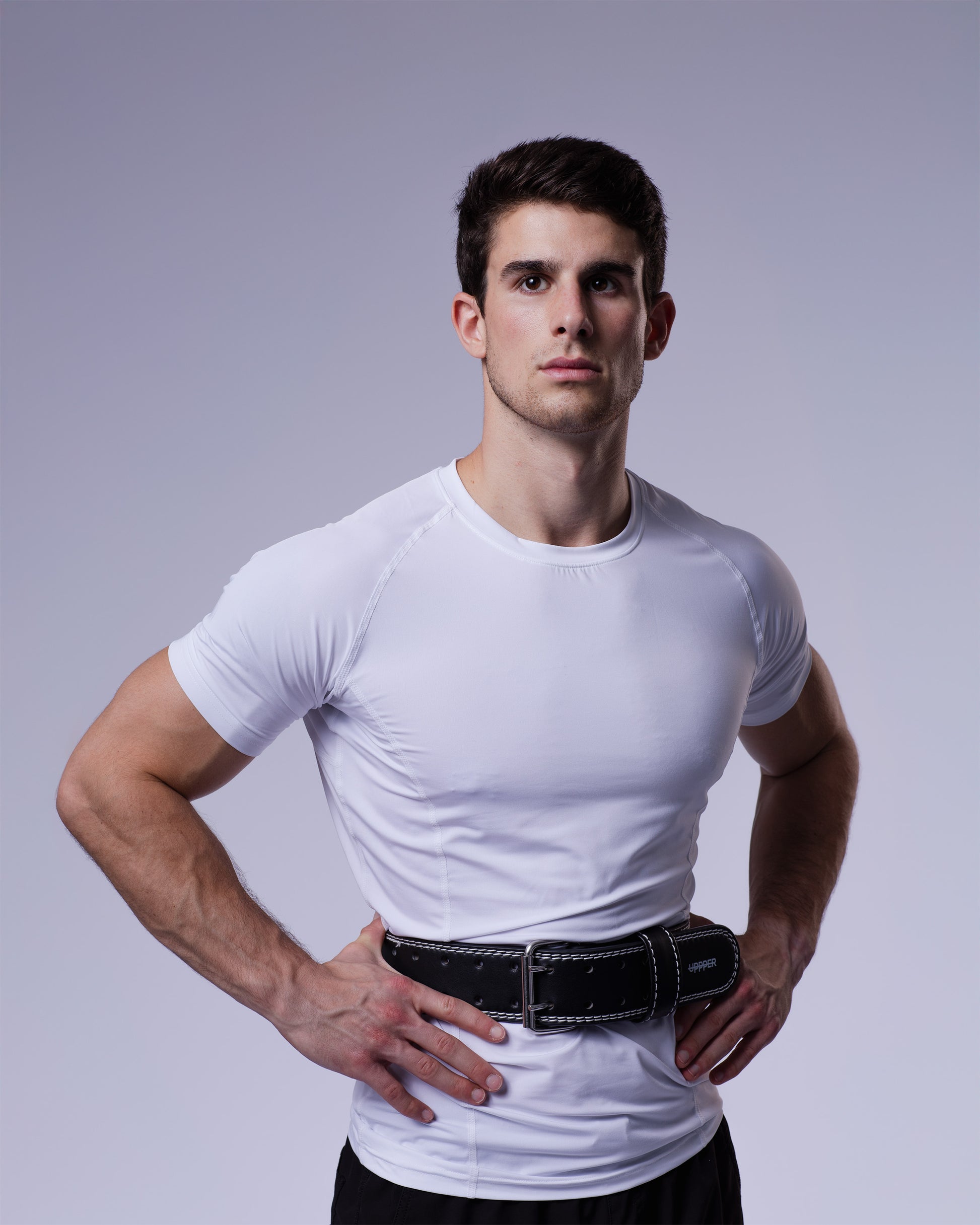 athlete wearing black uppper lifting belt
