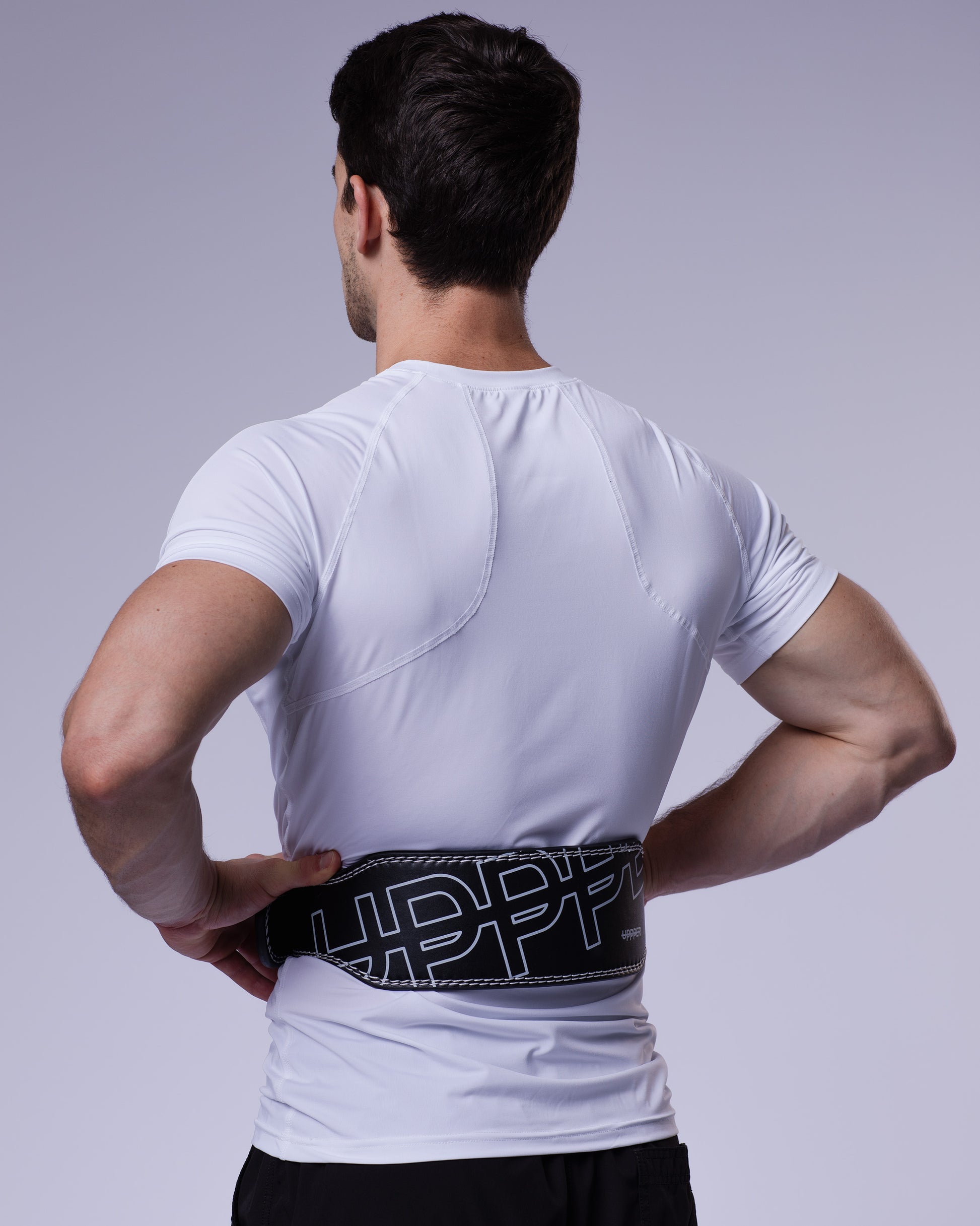 black uppper lifting belt worn on model product detail