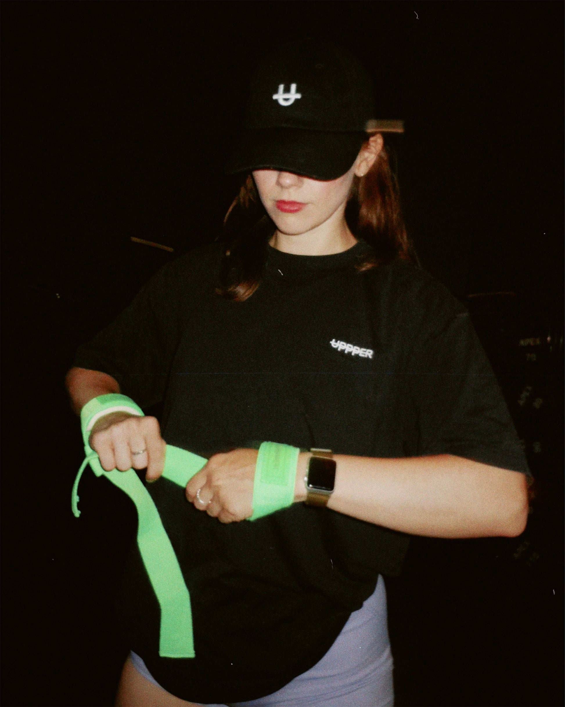 neon green uppper lifting straps looped showing strap length and texture