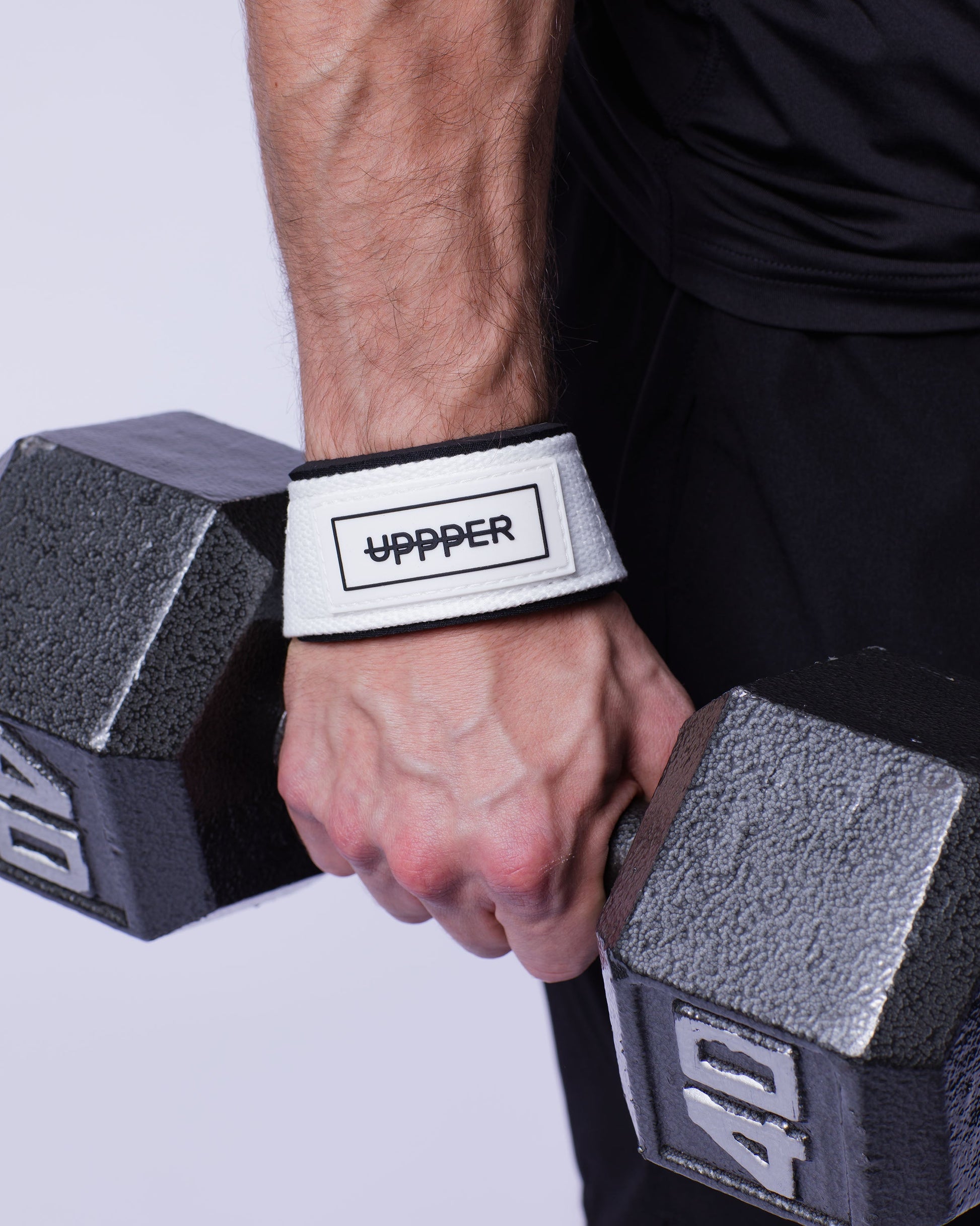 white uppper lifting strap close-up showing material and logo patch