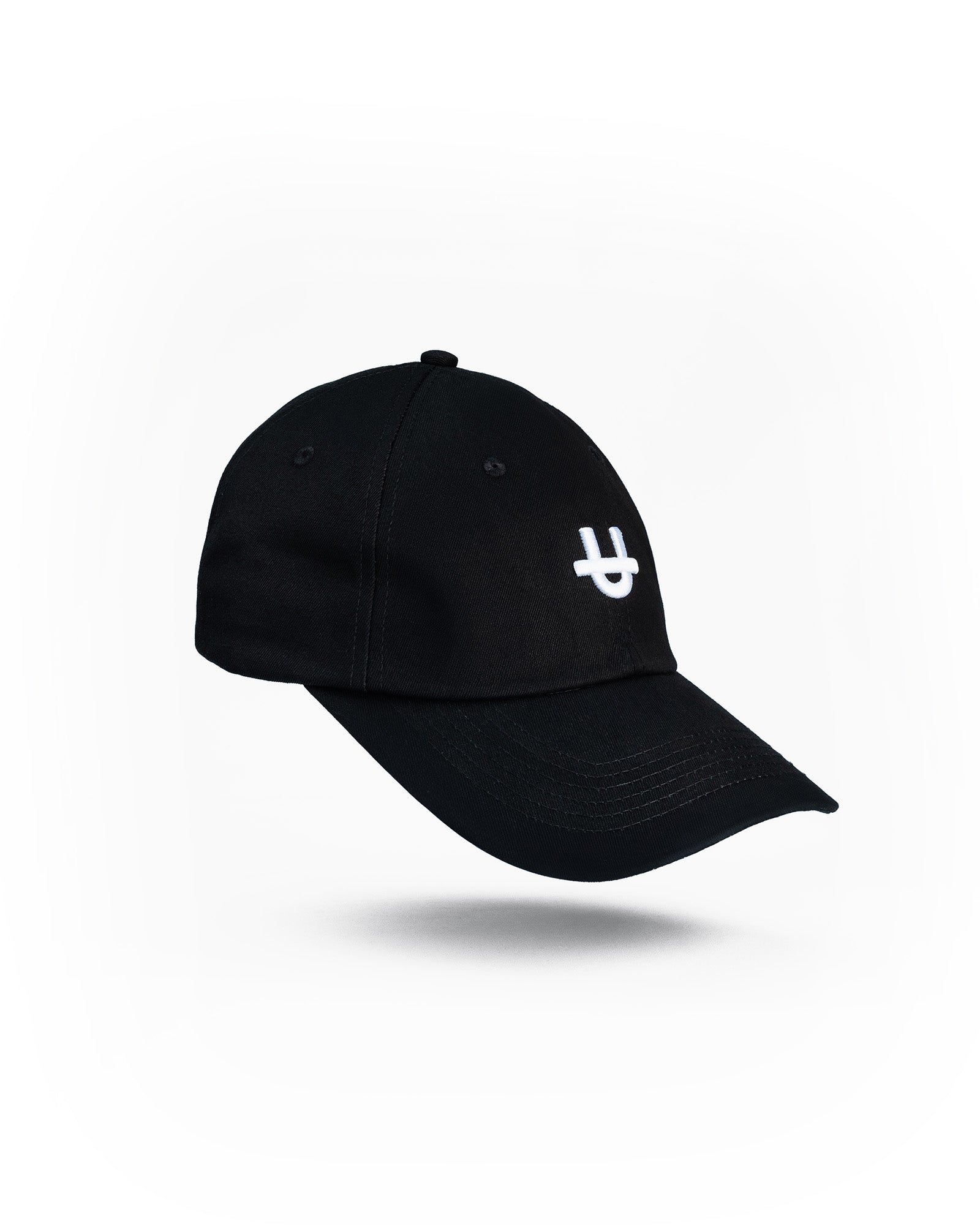black uppper dad cap with embroidered u logo on front panel side view on white background