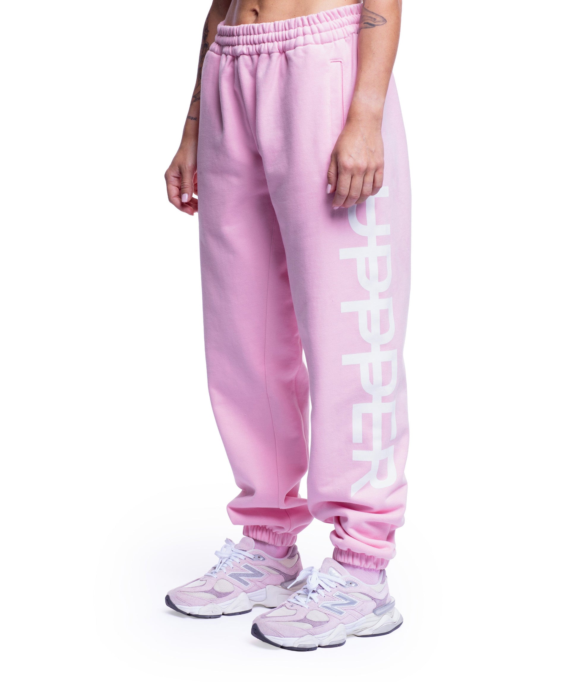 pink uppper sweatpants womens back view on white background