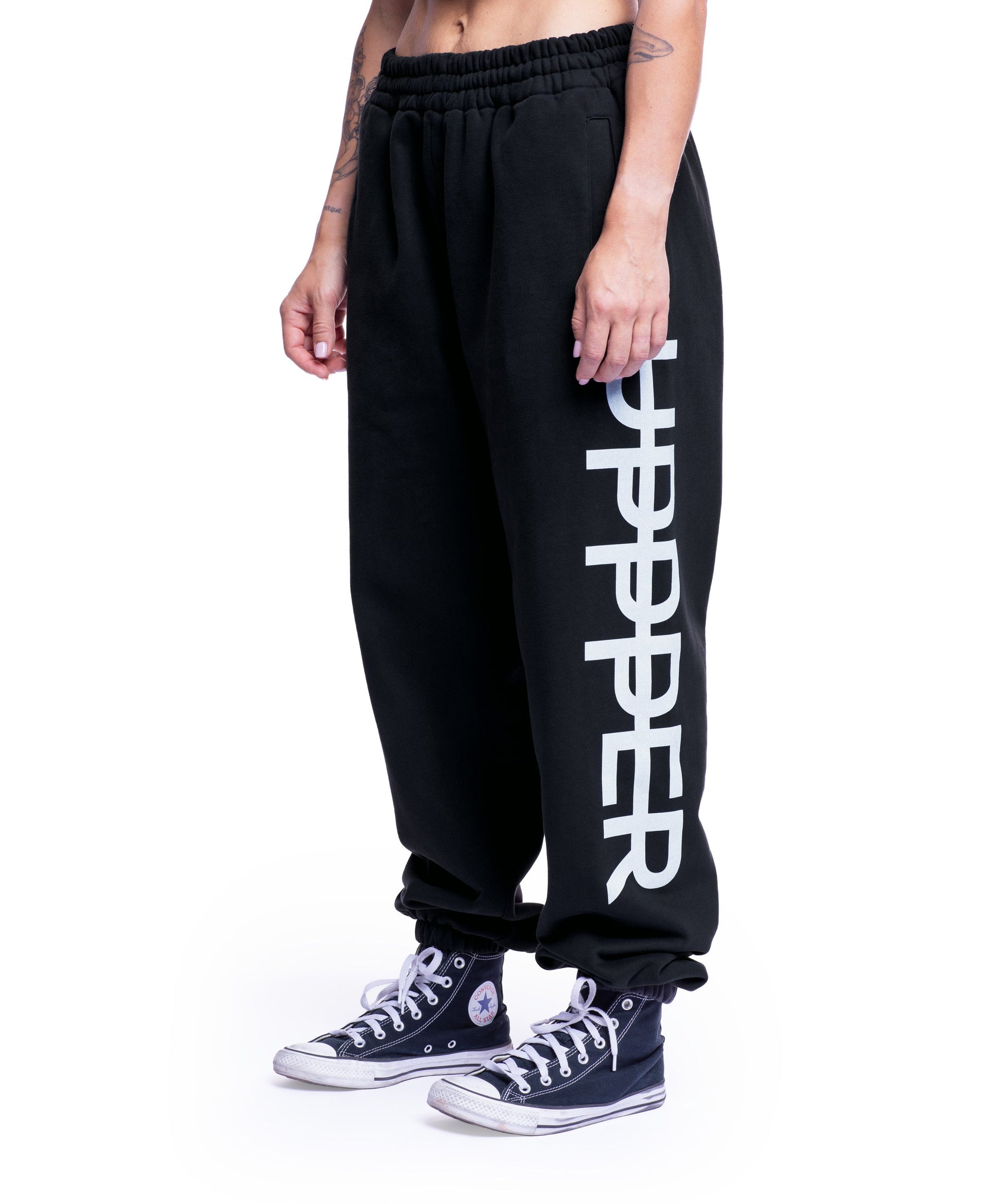 washed black uppper sweatpants womens back view on white background