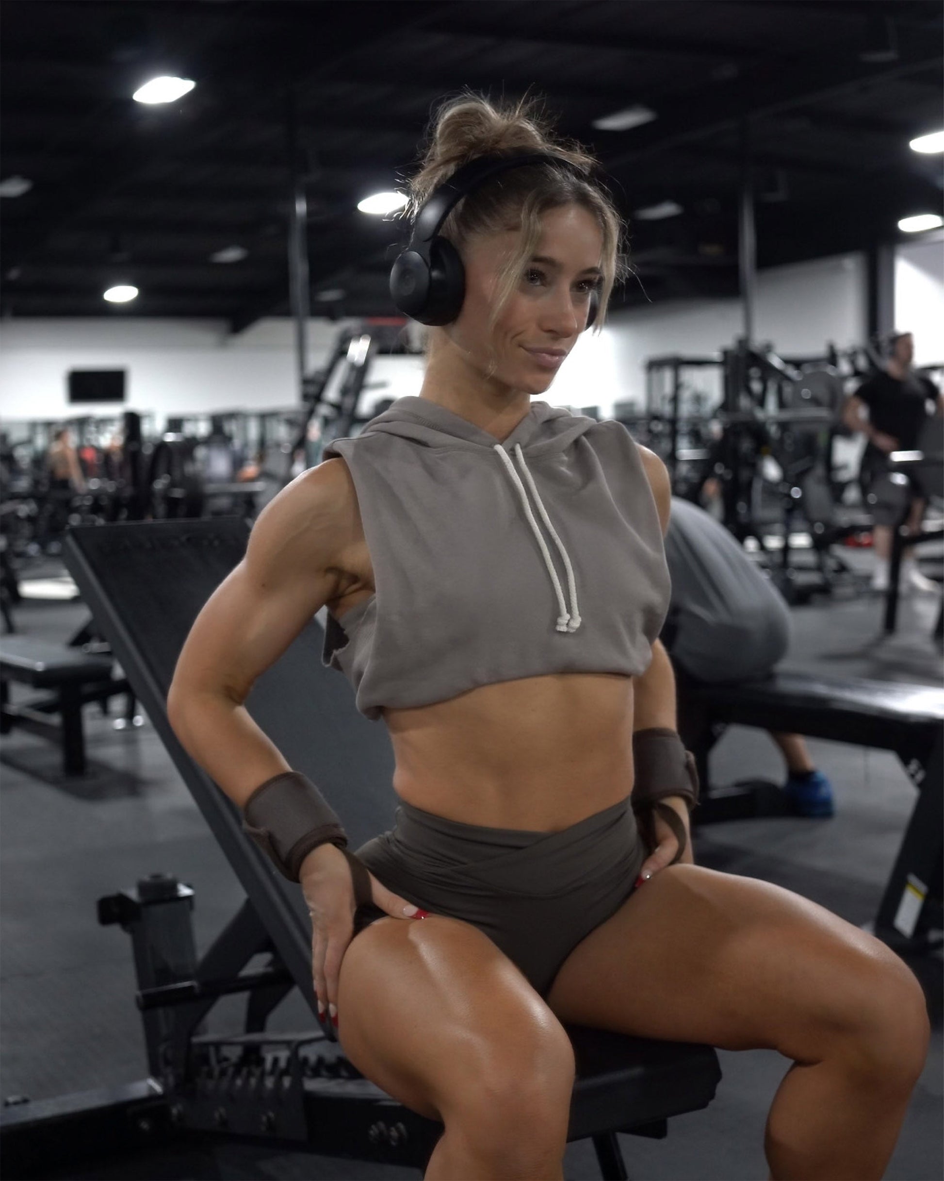 athlete poising in umber uppper wrist wraps in gym