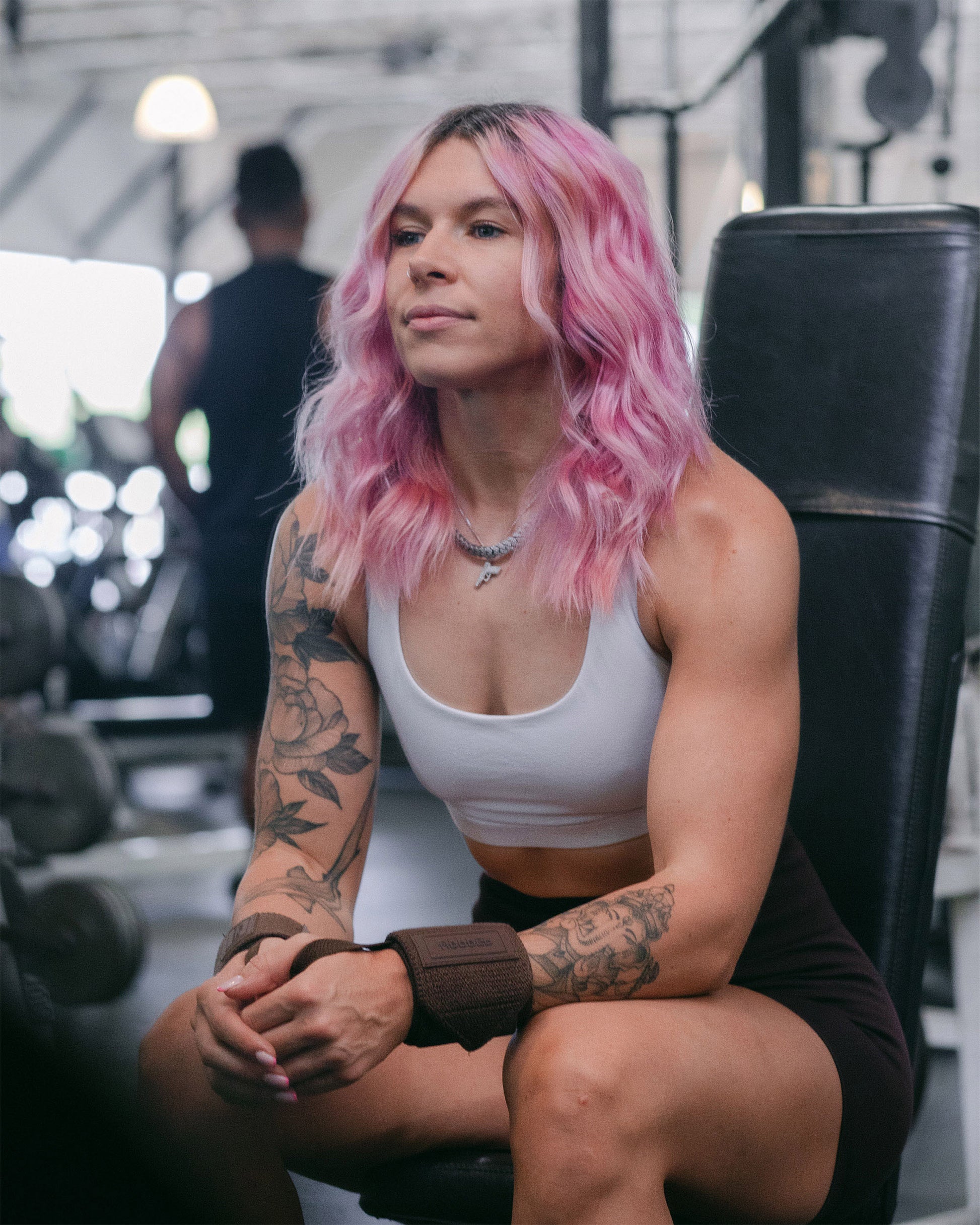 woman in umber uppper wrist wrap in gym