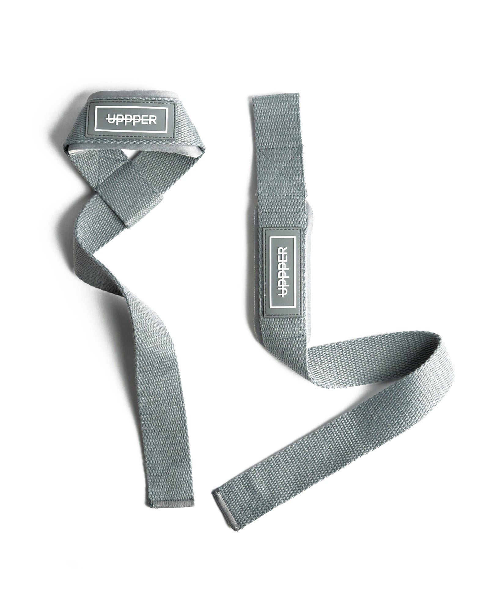 pair of grey uppper lifting straps flat lay on white background