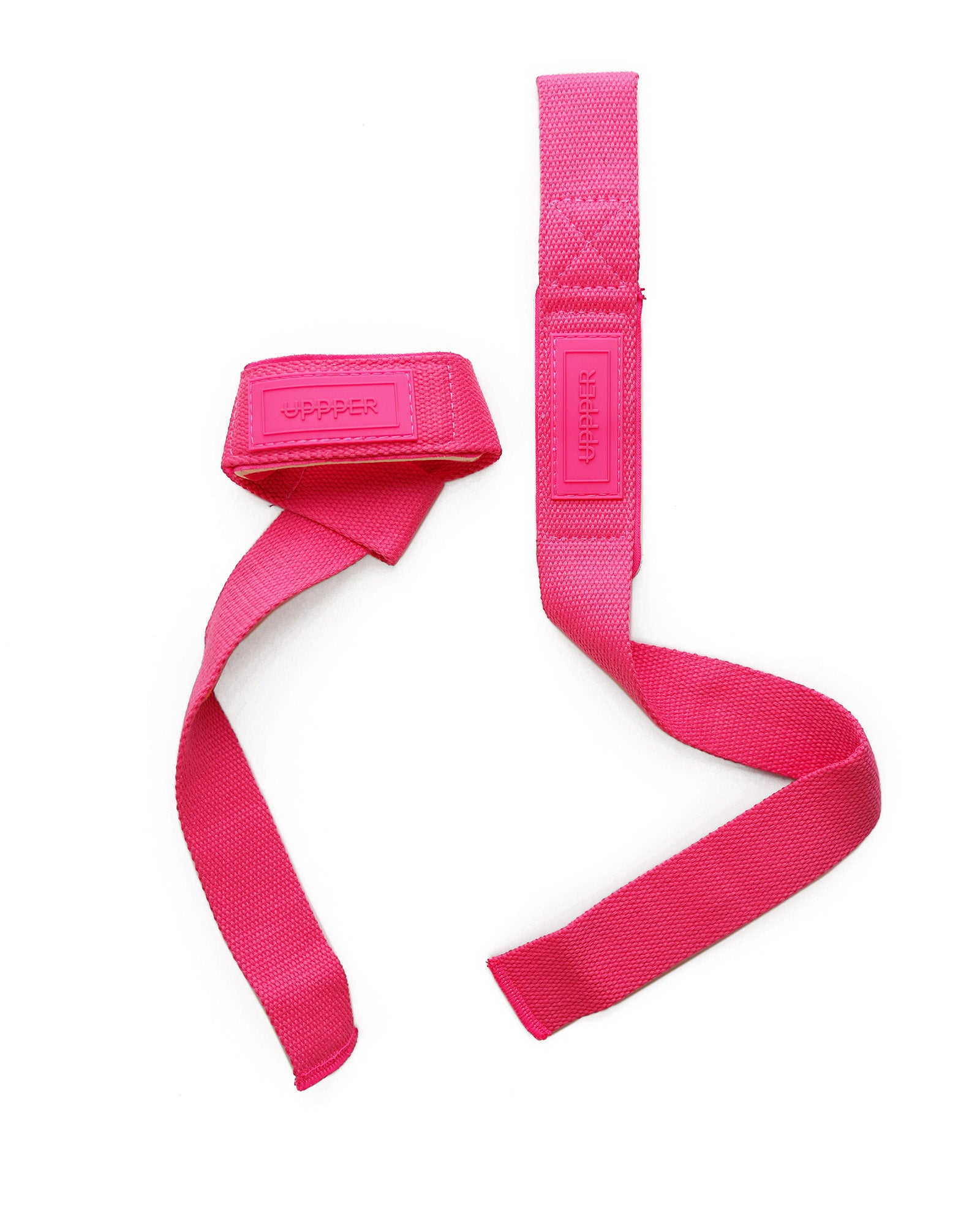 pair of neon pink uppper lifting straps flat lay on white background